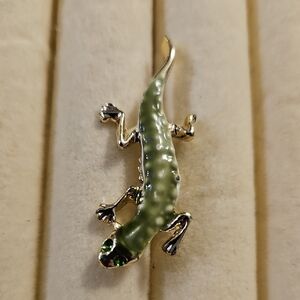 GREEN AND GOLD TONE, SALAMANDER, PIN WITH GREEN CRYSTAL EYES. 1 1/2" LONG